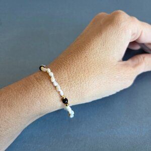 bracelet with fresh water pearls.